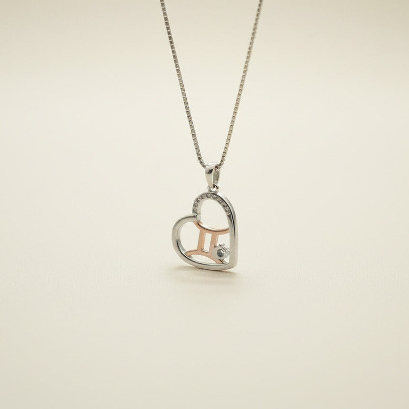 Zodiac Gemini Heart Pendant on a 925 Sterling Silver Chain With Rose Gold Detailling, and Diamond Colour Zircon Gemstones